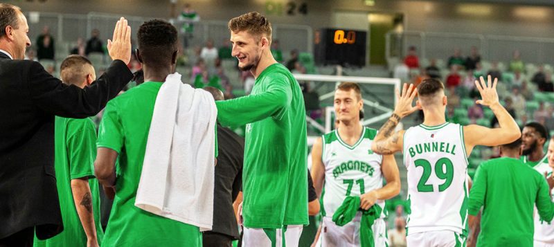 College Basketball Players Fundraising in green